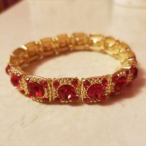 Gold and red bracelet
